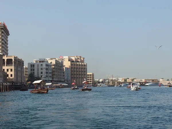 An abra crossing Dubai Creek between Bur Dubai and Deira.