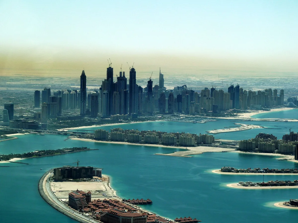 Dubai Marina and the fronds of Palm Jumeirah seen from the air.