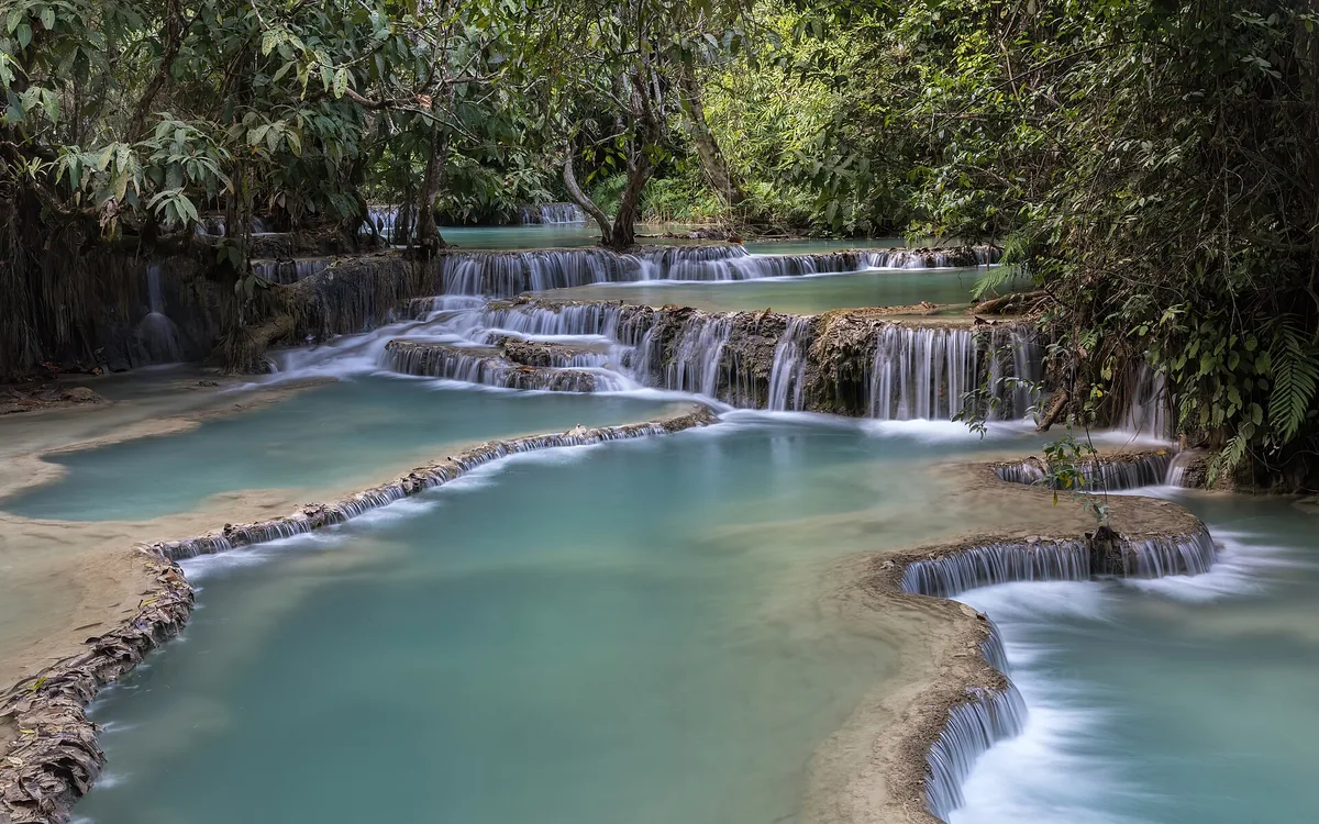The turquoise tiered pools of the Kuang Si waterfall near Luang Prabang.