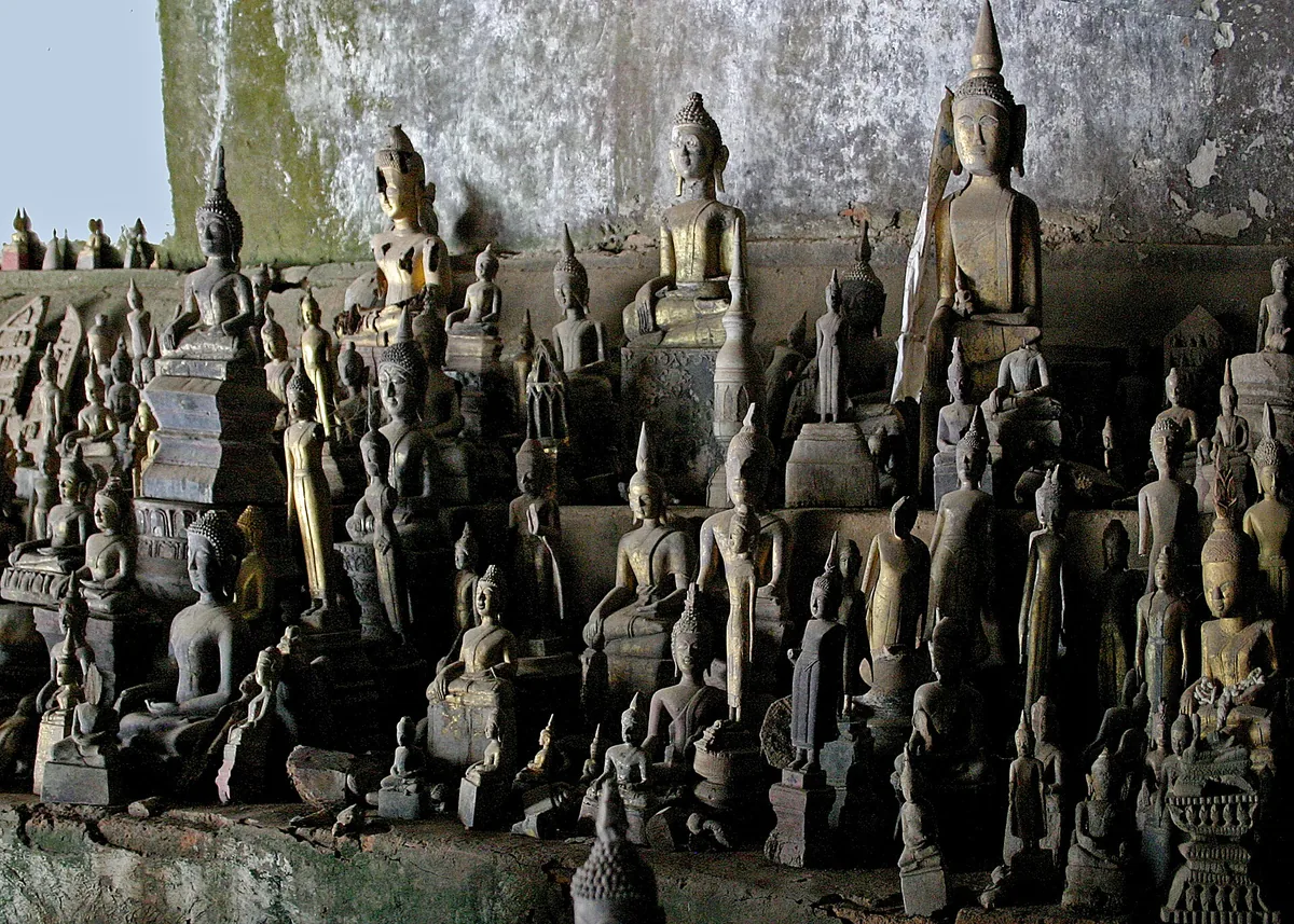 Hundreds of Buddha figures left in the Pak Ou caves above the Mekong.