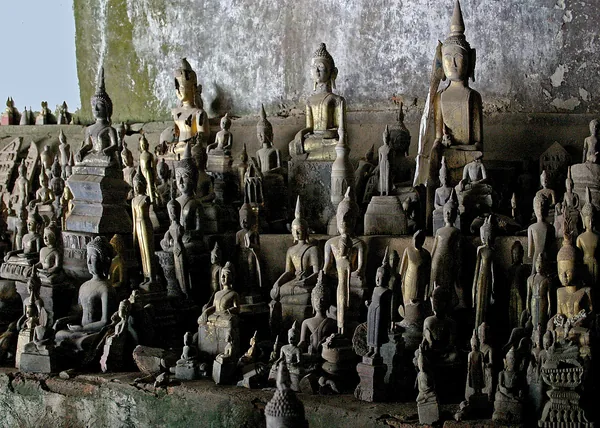 Hundreds of Buddha figures left in the Pak Ou caves above the Mekong.