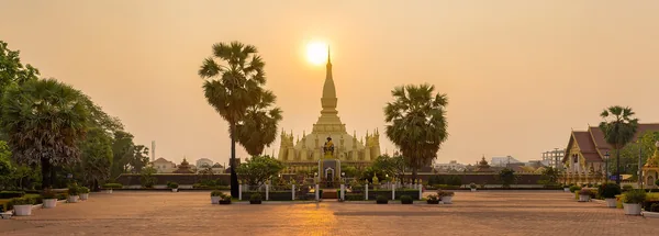 Pha That Luang, the golden stupa in Vientiane, at sunrise.
