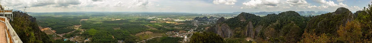 The view from the summit of Tiger Cave Temple over a plain of limestone karst towers.