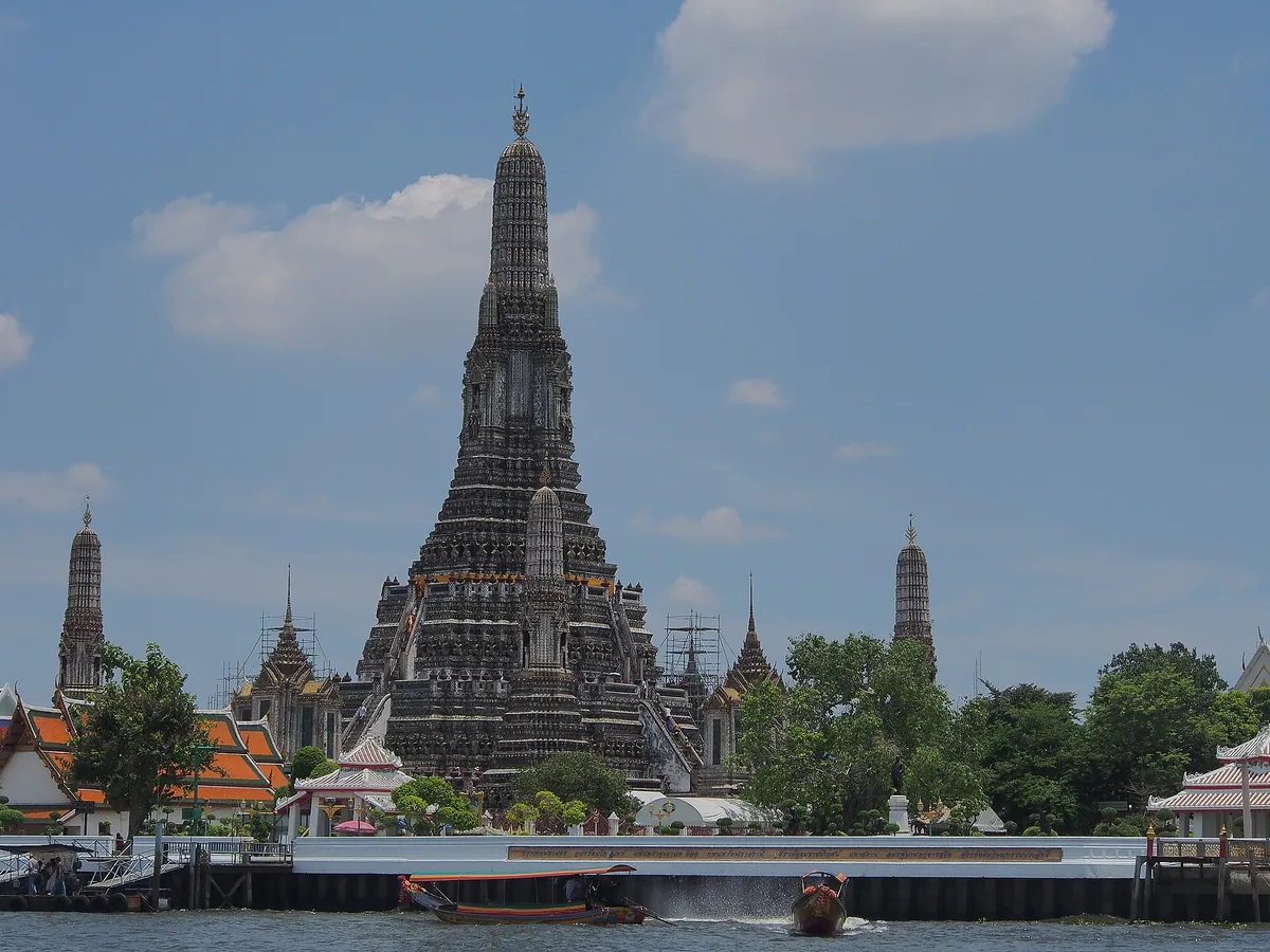 Wat Arun, the Temple of Dawn, seen across the Chao Phraya river in Bangkok.