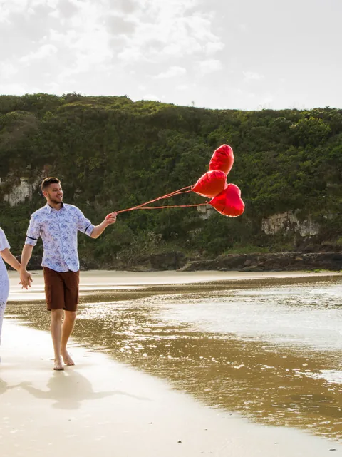 A couple walking on a quiet beach