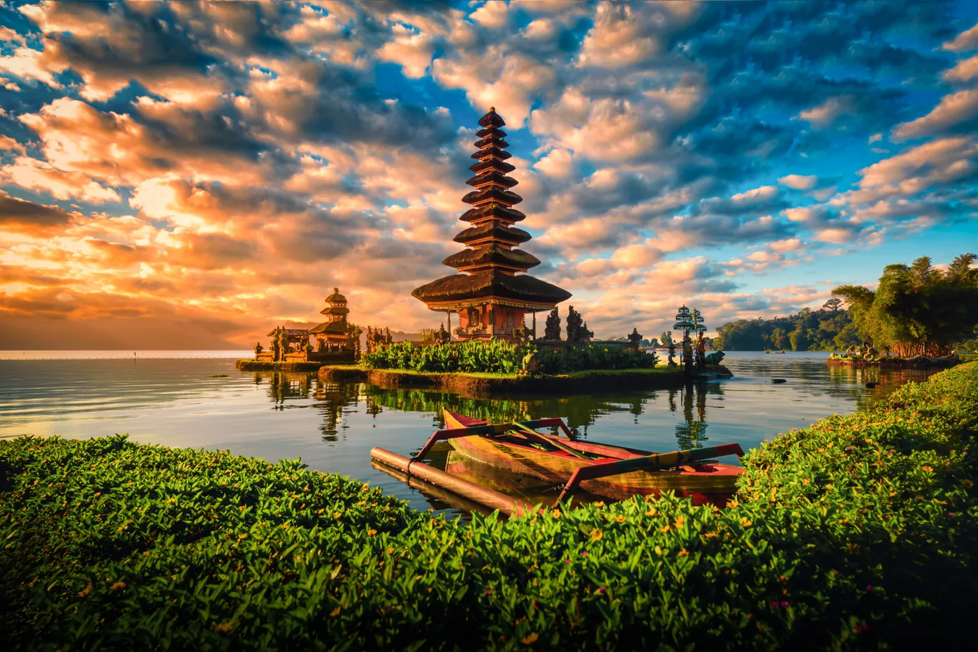Ulun Danu Beratan temple standing on the lake at sunrise, Bali