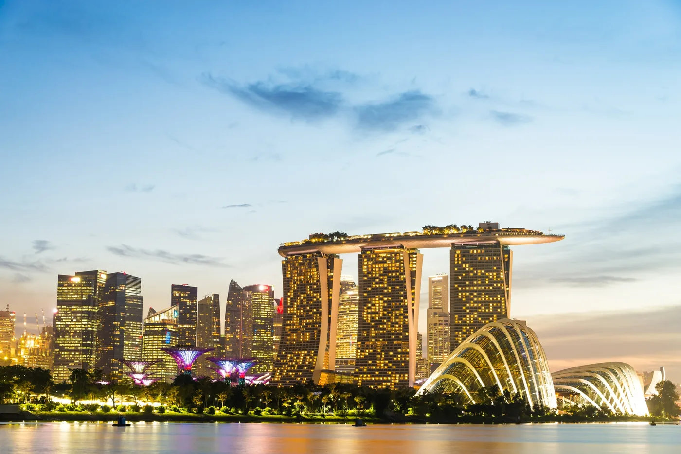 Marina Bay Sands and the Gardens by the Bay domes lit at dusk, Singapore