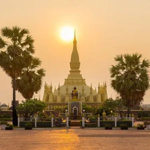 Pha That Luang, the golden stupa in Vientiane, at sunrise.